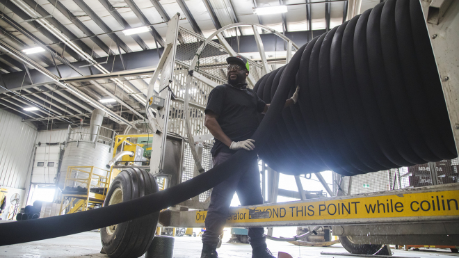 man working with piping 