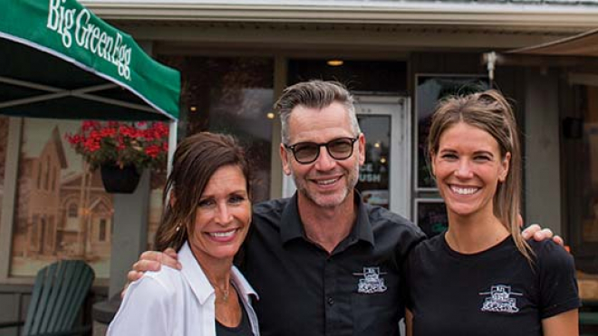 Bj's Country Market owners in front of their business