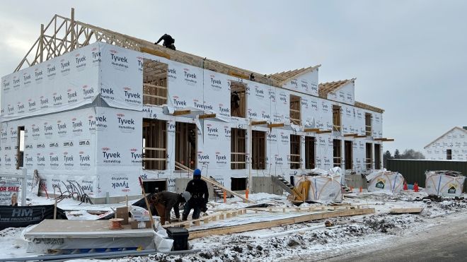 Row houses under construction in Komoka by developer Design for Happiness.