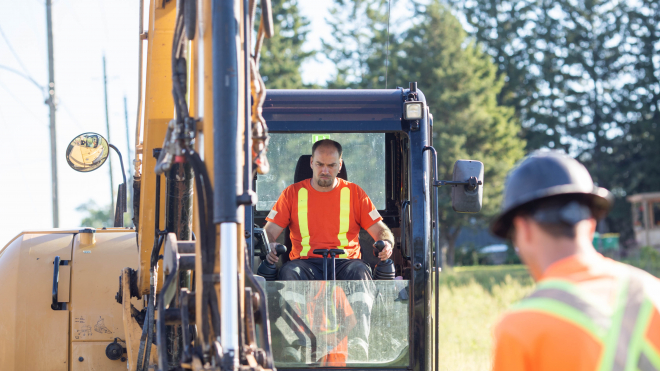 Man driving an excavator 