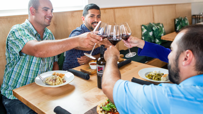 People having glass of wine