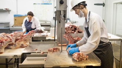 Man slicing meat