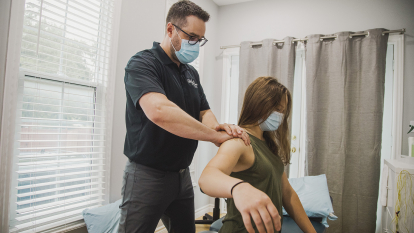 Chiropractor doing adjustments on patient 