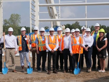 Group photo at industrial site